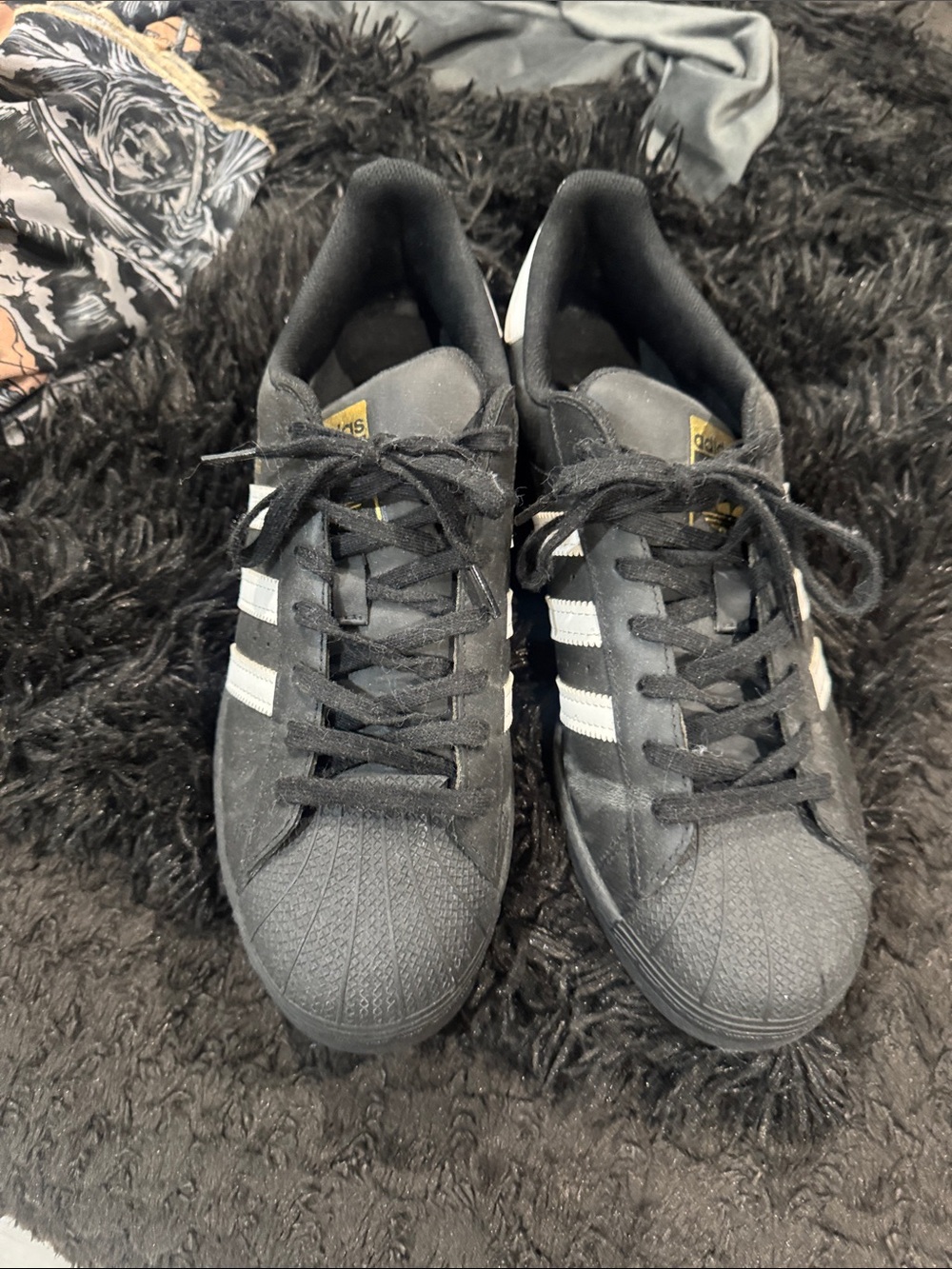 adidas Originals Black Sneakers with White Stripes and Gold Tongue Logo
